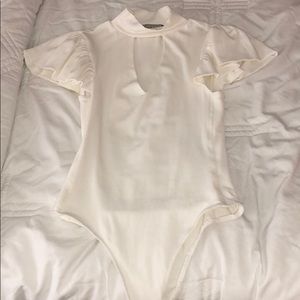 Cute white body suit
